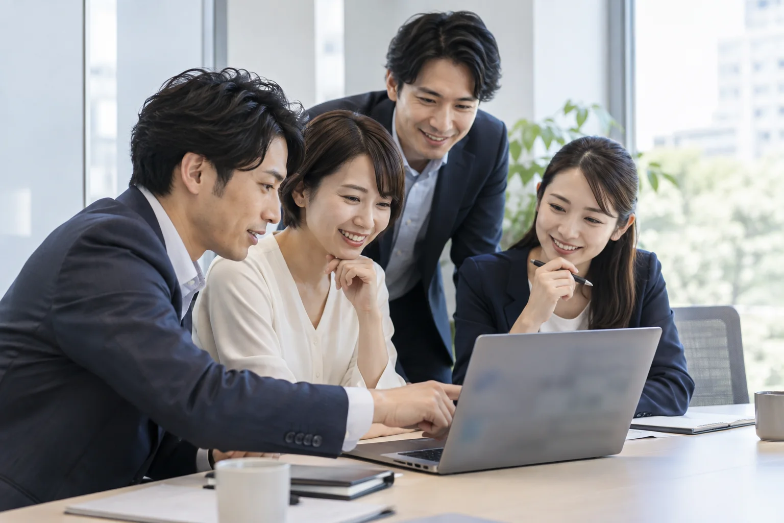 仲間と一緒にAIの使い方を学ぶイメージ